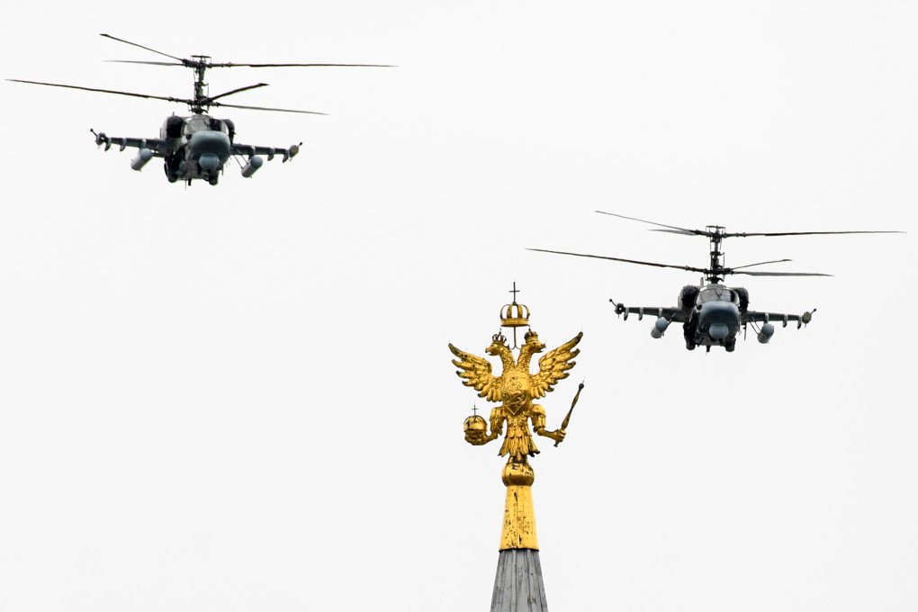 Russian Kamov Ka-52 Alligator attack helicopters fly over the Kremlin and Red Square in downtown Moscow on May 9, 2020. (Source: Getty Images) Russian Kamov Ka-52 Alligator attack helicopters fly over the Kremlin and Red Square in downtown Moscow on May 9, 2020. (Source: Getty Images)