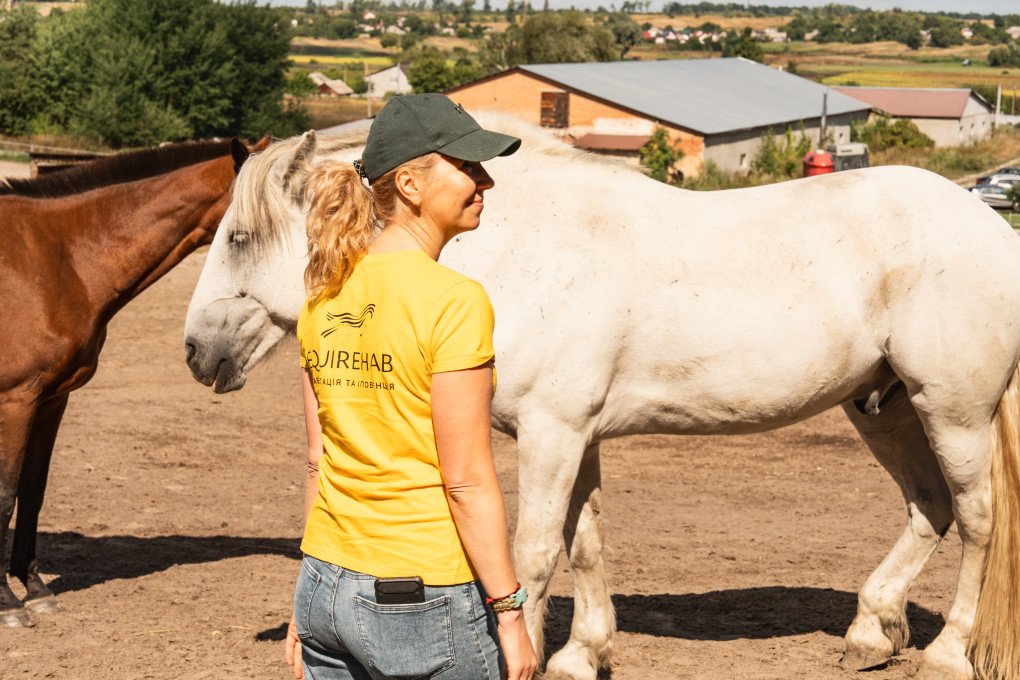 Psychologist Oksana with EquiReHab Ukraine supports service members throughout their equine-assisted recovery sessions. September 2026, Kyiv region. (Photo by Nika Lastvika/EquiReHab Ukraine) Psychologist Oksana with EquiReHab Ukraine supports service members throughout their equine-assisted recovery sessions. September 2026, Kyiv region. (Photo by Nika Lastvika/EquiReHab Ukraine)
