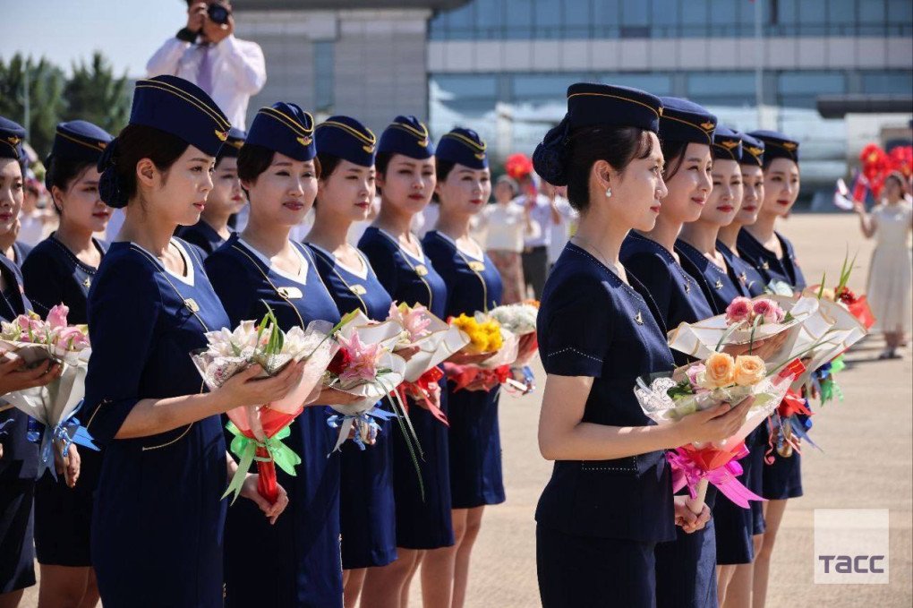 Korean airport personnel greet the first passengers of a direct commercial flight from Moscow to Pyongyang, North Korea, on July 28, 2025. (Source: TASS) Korean airport personnel greet the first passengers of a direct commercial flight from Moscow to Pyongyang, North Korea, on July 28, 2025. (Source: TASS)