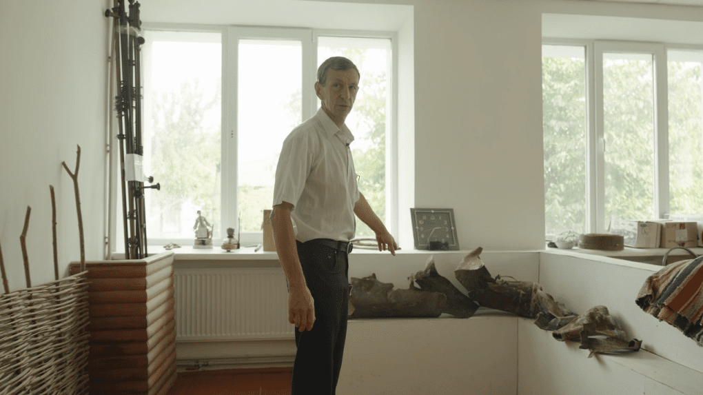 In one room of the Mykhailo-Kotsiubynsky Lyceum, the principal shows me missile fragments that were left behind, as well as a clock that once hung on the wall. Photo: UNITED24 Media