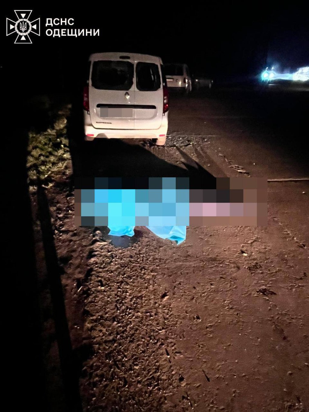 The covered body of a victim lies at the scene of the attack, which claimed the lives of 8 people. (Source: State Emergency Service) The covered body of a victim lies at the scene of the attack, which claimed the lives of 8 people. (Source: State Emergency Service)