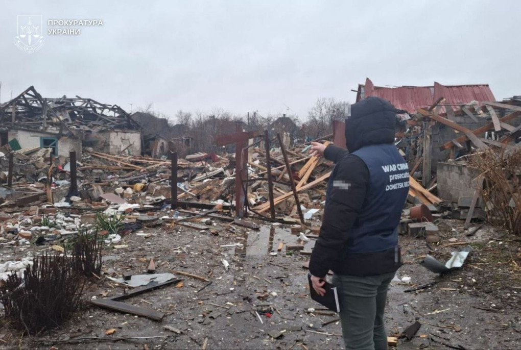 A war crimes investigator surveys the destruction in a private residential area of Kramatorsk after a direct hit on a family home on February 13, 2026. (Photo: Donetsk Regional Prosecutor’s Office)