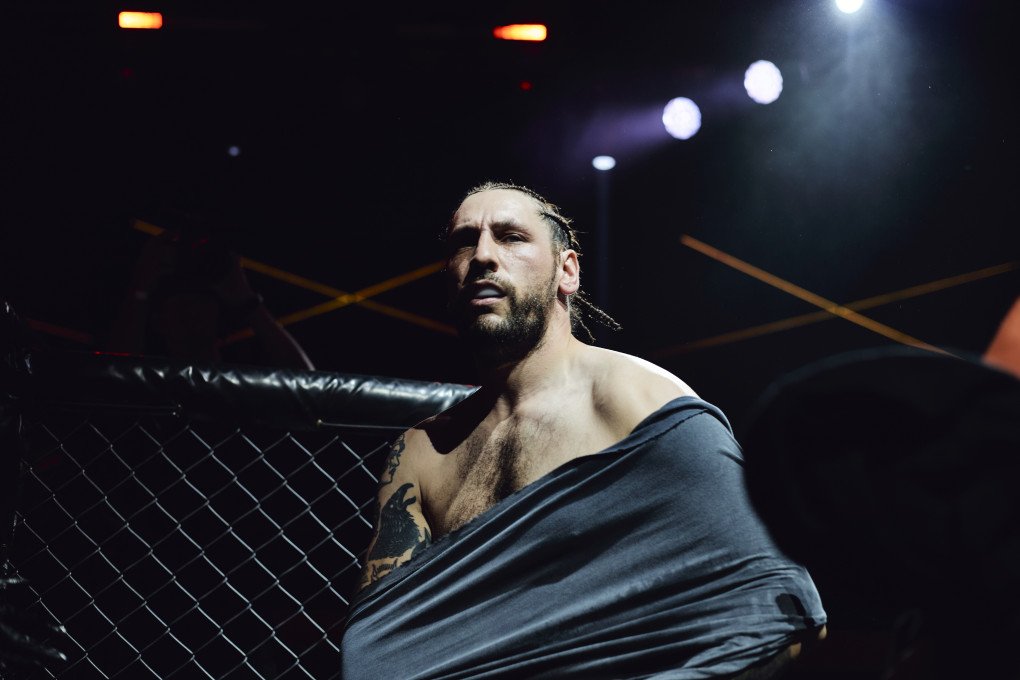 A fighter of the Third Army Corps enters the octogon at the international MMA competition “IDU NA VY: Tryzna.” Kyiv, Ukraine, Otober 9, 2026 (Photo: Louis Beaudemont/UNITED24 Media)