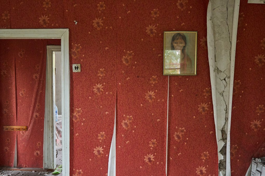 A children's drawing in a house destroyed by Russian shelling. A children's drawing in a house destroyed by Russian shelling.
