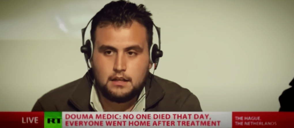 Kremlin-backed TV channel Russia Today broadcasts the testimony of Abdul Rahman Hijazi, a witness of the attack. (Source: RT) Kremlin-backed TV channel Russia Today broadcasts the testimony of Abdul Rahman Hijazi, a witness of the attack. (Source: RT)