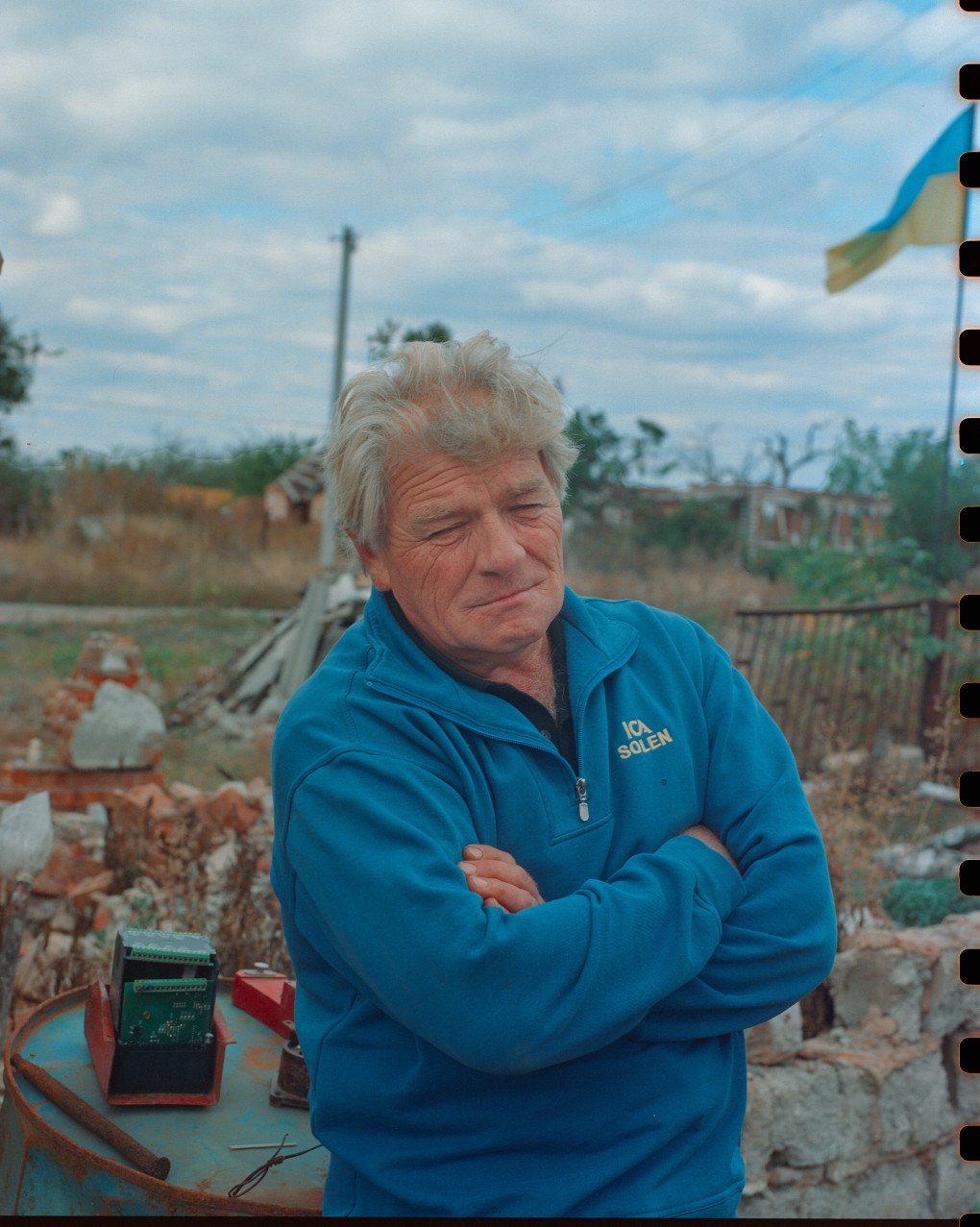 Valerii Standing near their house which was completely destroyed by Russian forces. Dovhenke, Ukraine. October, 2025. Photo by Joshua Olley/UNITED24 Media.