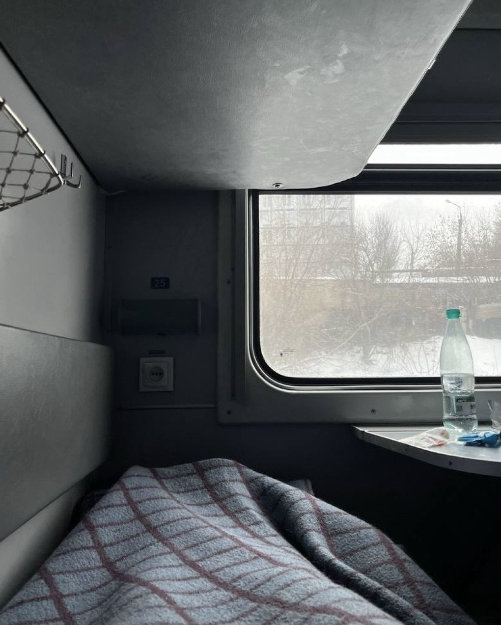 While living in Kyiv, Violetta always returned home for the holidays; this photo was taken on the train to Mariupol on December 31, 2021. Photo: Violetta Khankevich