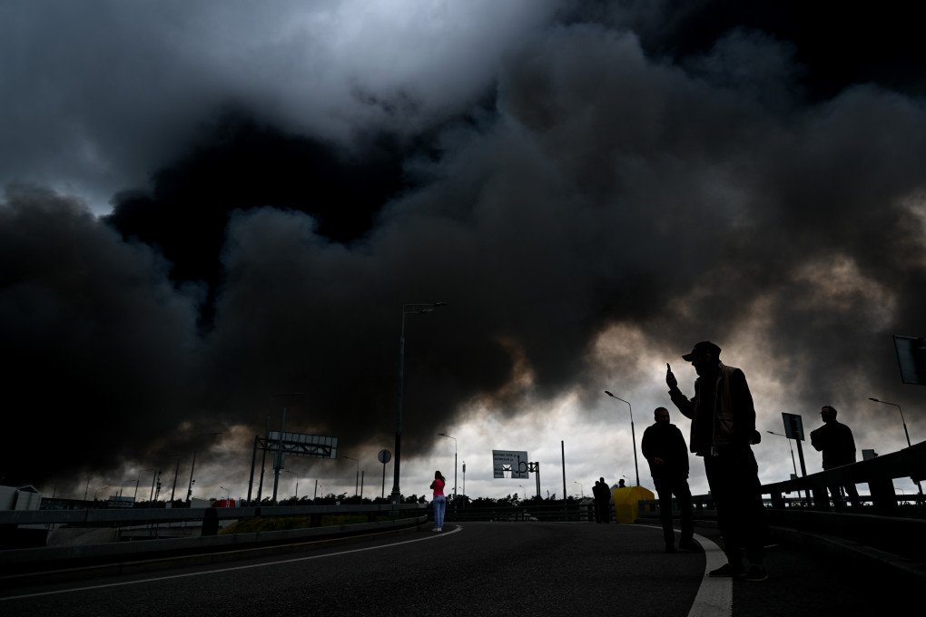 Black smoke rises from the refinery where a fire broke out following a strike as firefighting efforts continue in Moscow, Russia on June 18, 2026. (Photo by Sefa Karacan via Getty Images)