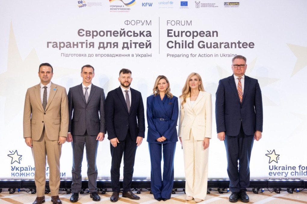 Ukraine’s First Lady Olena Zelenska (center right) and Iryna Tuliakova, Head of the Coordination Center for Family Upbringing and Child Care Development (second from right), together with Ukrainian officials and international partners at the “European Child Guarantee: Preparing for Action in Ukraine” forum in Kyiv on July 24, 2025. (Source: Ukraine’s Presiden’t Office website)