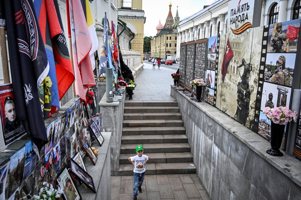 A boy visits an improvised memorial for fallen fighters of Wagner private military company in central Moscow, with St. Basil's cathedral in backgrounds, on July 6, 2026. (Photo by Alexander Nemenov via Getty Images) A boy visits an improvised memorial for fallen fighters of Wagner private military company in central Moscow, with St. Basil's cathedral in backgrounds, on July 6, 2026. (Photo by Alexander Nemenov via Getty Images)