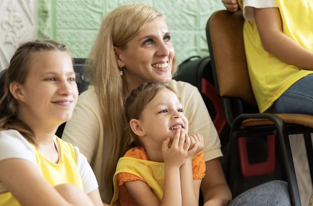 Iryna Tuliakova during a visit to a children’s home in Chernivtsi region together with Ukraine's First Lady Olena Zelenska. The visit focused on mentoring initiatives and support for children growing up without parental care. (Source: Official Facebook page of Olena Zelenska)