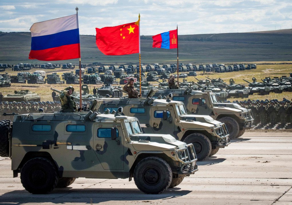 Russian, Chinese, and Mongolian troops and military equipment parade at the end of the day of the Vostok-2018 (East-2018) military drills at Tsugol training ground not far from the Chinese and Mongolian border in Siberia, on September 13, 2018. (Source: Getty Images) Russian, Chinese, and Mongolian troops and military equipment parade at the end of the day of the Vostok-2018 (East-2018) military drills at Tsugol training ground not far from the Chinese and Mongolian border in Siberia, on September 13, 2018. (Source: Getty Images)