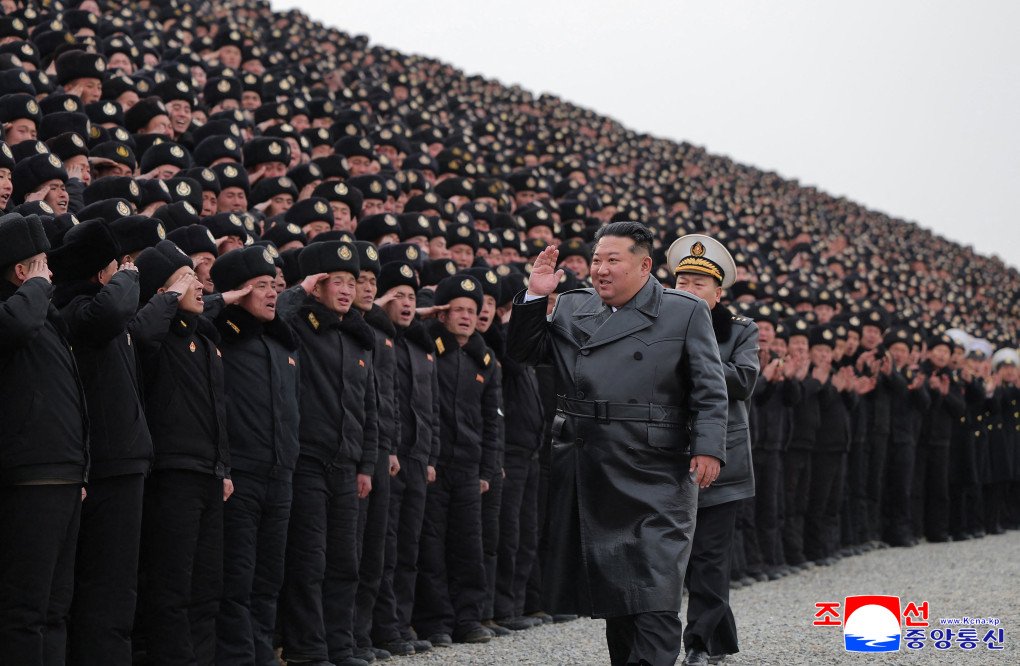 North Korea's official Korean Central News Agency (KCNA) via KNS on February 2, 2026 shows North Korean leader Kim Jong Un participating in a commemorative photo session with soldiers who were involved in the construction of the Sinuiju Combined Greenhouse Farm in North Pyongan Province, North Korea. (Photo by KCNA VIA KNS via Getty Images)