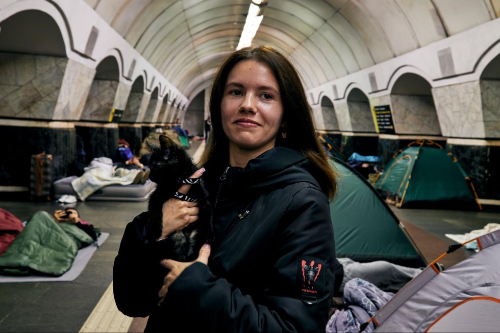 Oleksandra and her cat Pupa, take shelter in a Kyiv metro station, tens of meters underground. Kyiv, Ukraine, October 6, 2026 (Photo: Louis Beaudemont/UNITED24 Media)