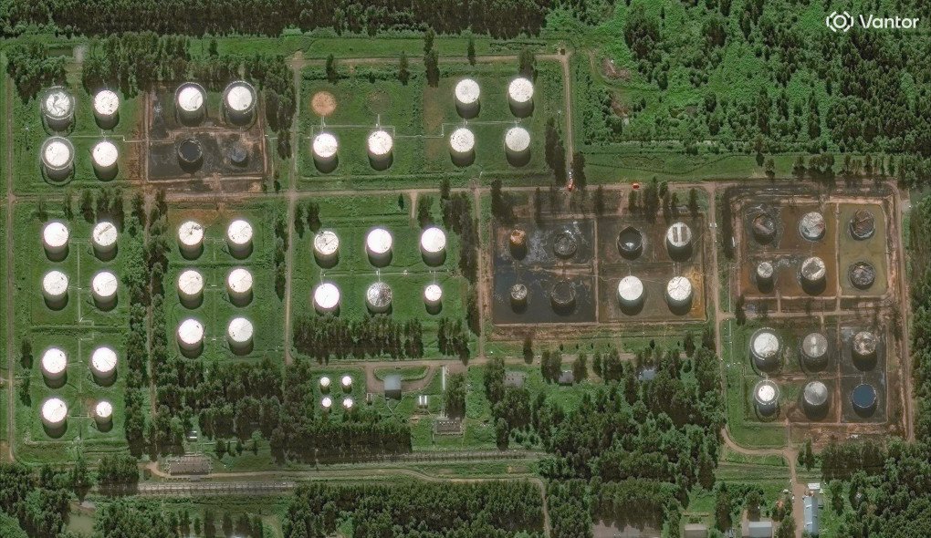 Satellite image shows damaged oil storage tanks in Rybinsk with visible burn marks and impact scars. (Source: Vantor)