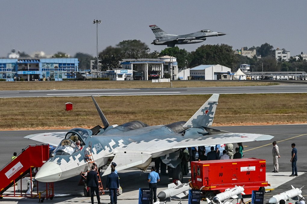 The US F-16 fighter jet flies over the Russian Sukhoi Su-57 fifth-generation fighter aircraft during Aero India 2025, a military aviation exhibition at the Yelahanka Air Force Station in Bengaluru on February 13, 2025. (Source: Getty Images) The US F-16 fighter jet flies over the Russian Sukhoi Su-57 fifth-generation fighter aircraft during Aero India 2025, a military aviation exhibition at the Yelahanka Air Force Station in Bengaluru on February 13, 2025. (Source: Getty Images)