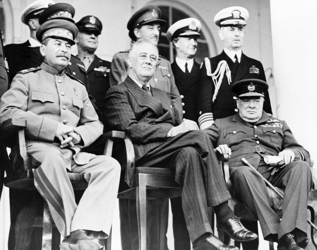Tehran Conference. Joseph Stalin (left), Franklin D. Roosevelt (centre) and Winston Churchill. The conference was held from November 28 to December 1, 1943. (Photo by Universal History Archive via Getty Images) Tehran Conference. Joseph Stalin (left), Franklin D. Roosevelt (centre) and Winston Churchill. The conference was held from November 28 to December 1, 1943. (Photo by Universal History Archive via Getty Images)