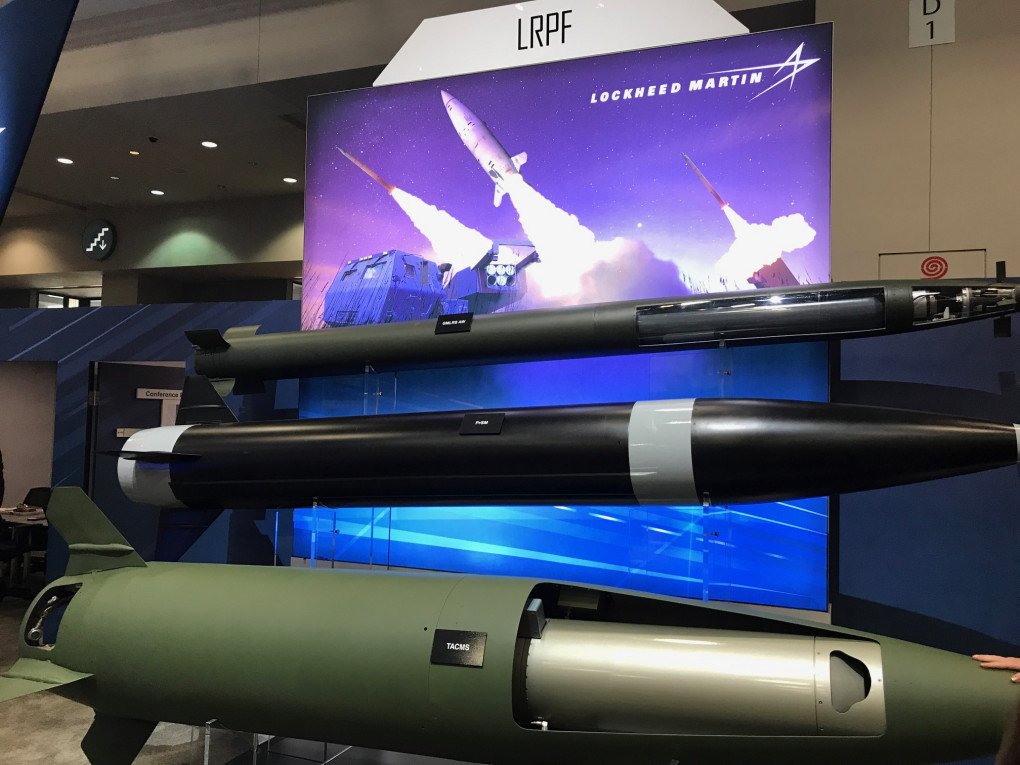 Precision Strike Missile (PrSM) (center) at a Lockheed Martin stand during an exhibition. (Source: nicholadrummond/X)