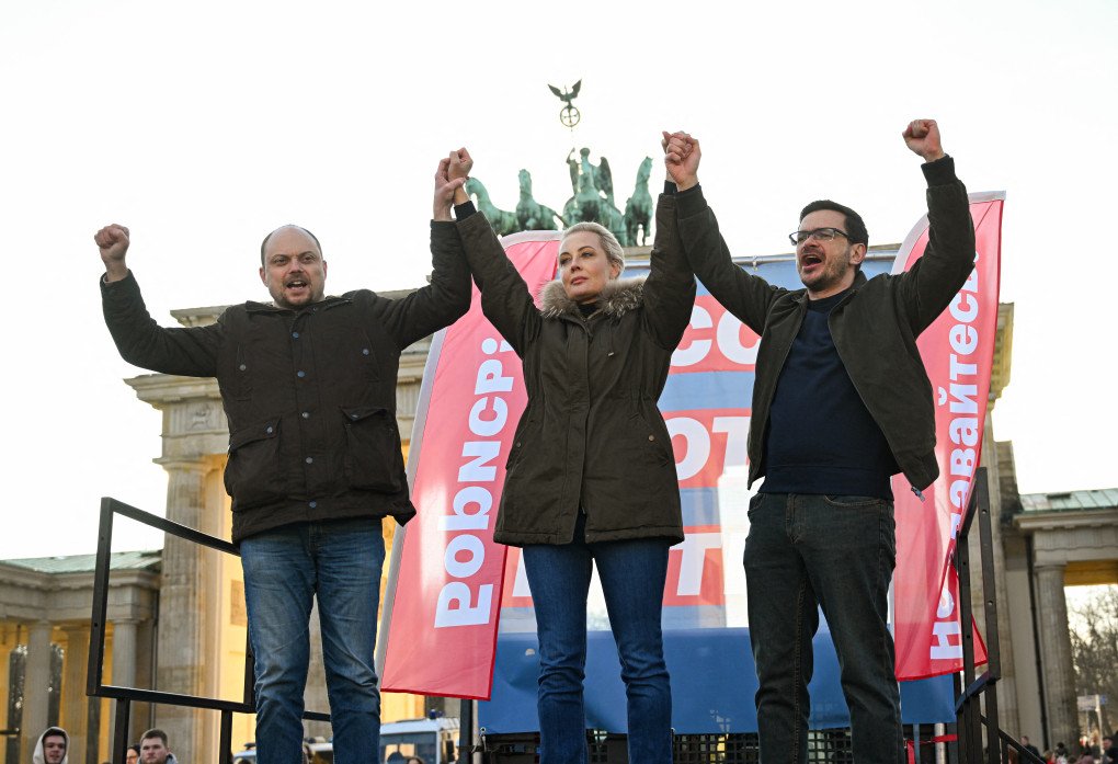 Russian journalist and activist Vladimir Kara-Murza, Alexei Navalny’s widow Yulia Navalnaya and Russian opposition figure Ilya Yashin take part in a march of members of the Russian opposition in Berlin in front of the Brandenburg Gate on March 1, 2025. Photo by RALF HIRSCHBERGER/AFP via Getty Images.