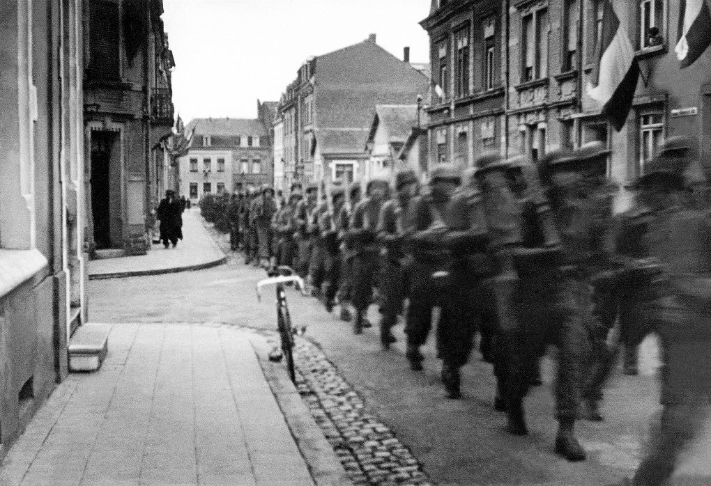 The 331st Regiment of the US 83rd Infantry Division march through Luxembourg, World War II, their faces blurred by their movement, September 1944. (Photo by Tony Vaccaro via Getty Images) The 331st Regiment of the US 83rd Infantry Division march through Luxembourg, World War II, their faces blurred by their movement, September 1944. (Photo by Tony Vaccaro via Getty Images)