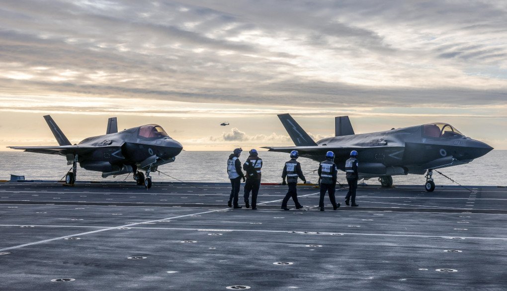 Crews walk towards a Royal Navy F-35B Lightning fighter jet to prepare it for take-off from the deck of the British aircraft carrier HMS Prince Of Wales, in an undisclosed location, on April 24, 2025, following its deployment to the Indo-Pacific region. (Source: Getty Images) Crews walk towards a Royal Navy F-35B Lightning fighter jet to prepare it for take-off from the deck of the British aircraft carrier HMS Prince Of Wales, in an undisclosed location, on April 24, 2025, following its deployment to the Indo-Pacific region. (Source: Getty Images)