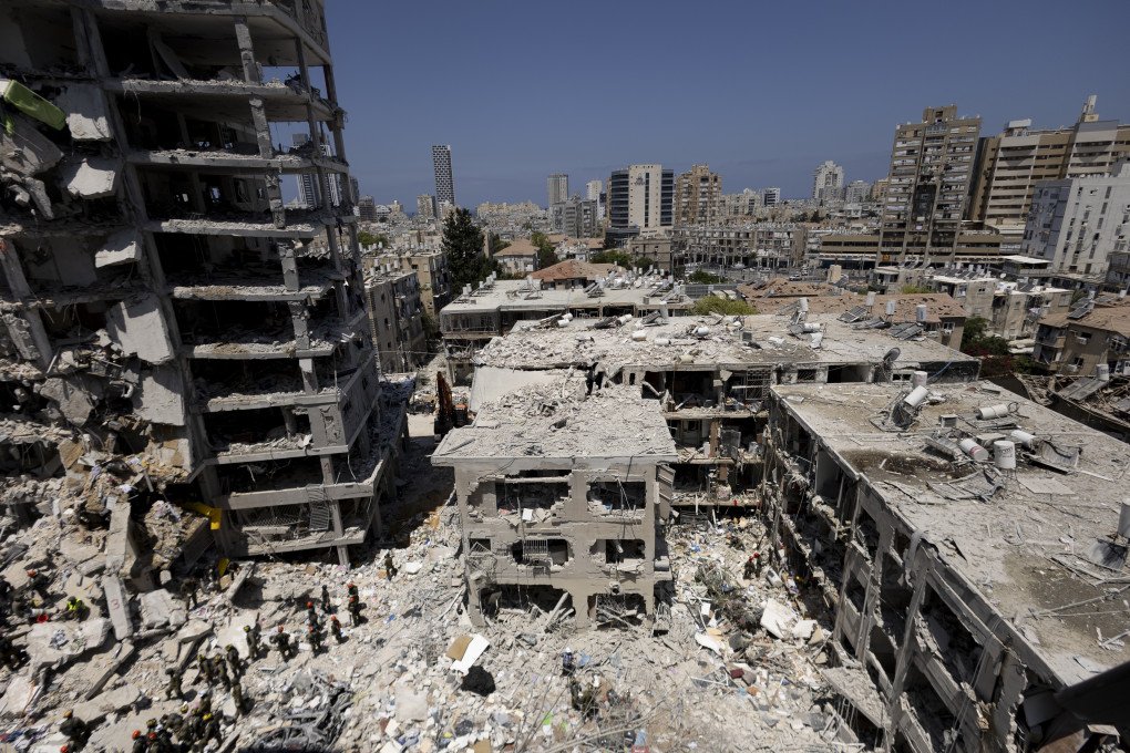 Emergency and rescue soldiers search for trapped people inside heavily damaged buildings after an overnight missile strike from Iran on June 15, 2025, in Bat Yam, Israel. (Source: Getty Images) Emergency and rescue soldiers search for trapped people inside heavily damaged buildings after an overnight missile strike from Iran on June 15, 2025, in Bat Yam, Israel. (Source: Getty Images)