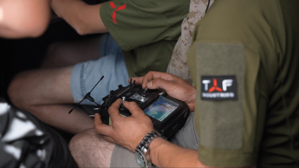A TAF Industries pilot is holding a control that operates the drones via radio link. Photo: Mykyta Shandyba/UNITED24 Media A TAF Industries pilot is holding a control that operates the drones via radio link. Photo: Mykyta Shandyba/UNITED24 Media