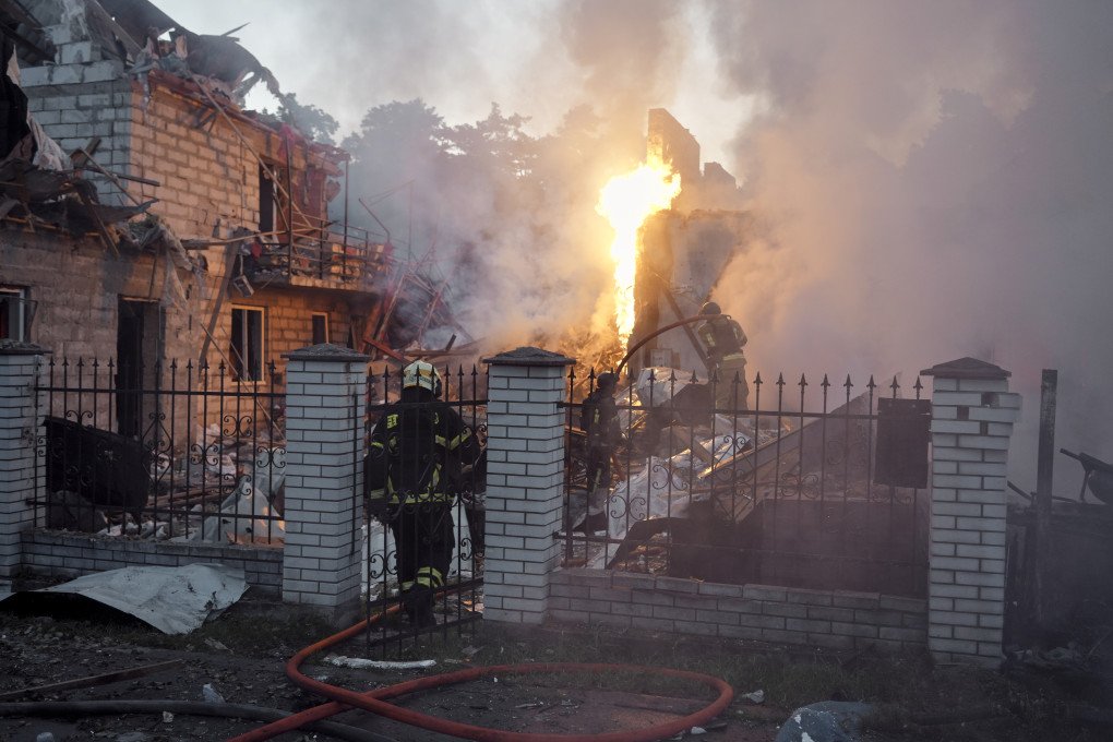 A firefighter searches through heavy structural debris inside a damaged apartment building to locate trapped residents. (Source: Lucile Brizard/UNITED24 Media) A firefighter searches through heavy structural debris inside a damaged apartment building to locate trapped residents. (Source: Lucile Brizard/UNITED24 Media)
