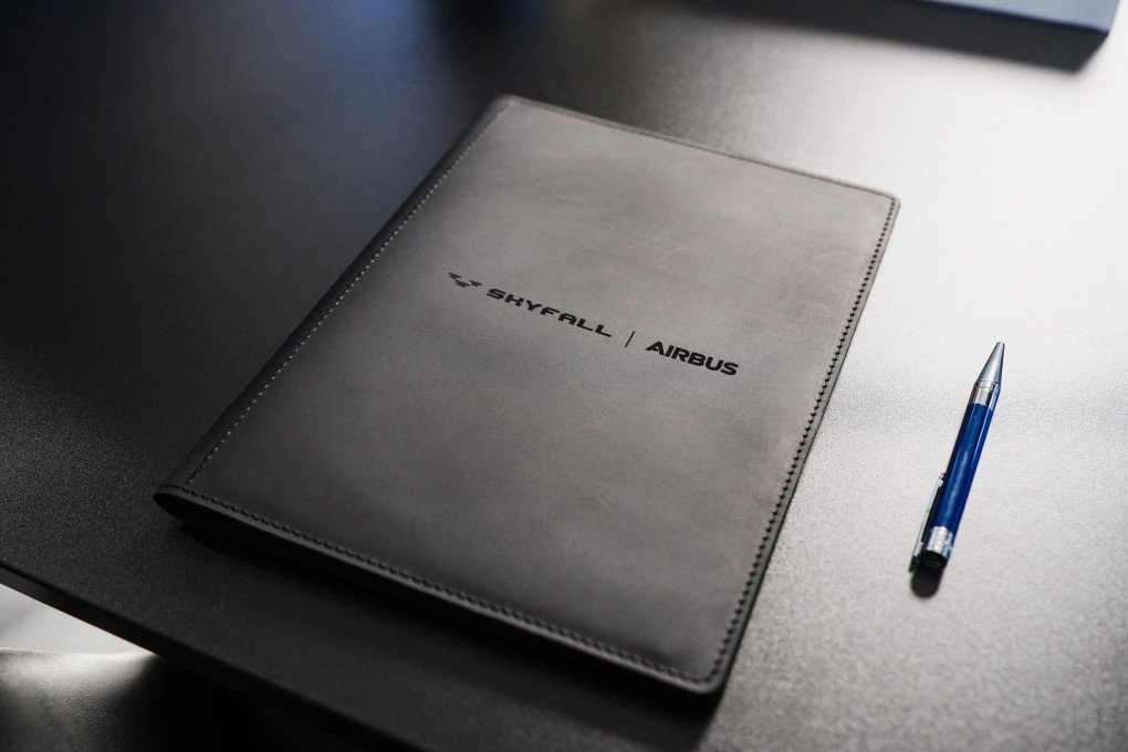 A SkyFall and Airbus memorandum folder is pictured during the signing of the companies’ strategic partnership. (Source: SkyFall)