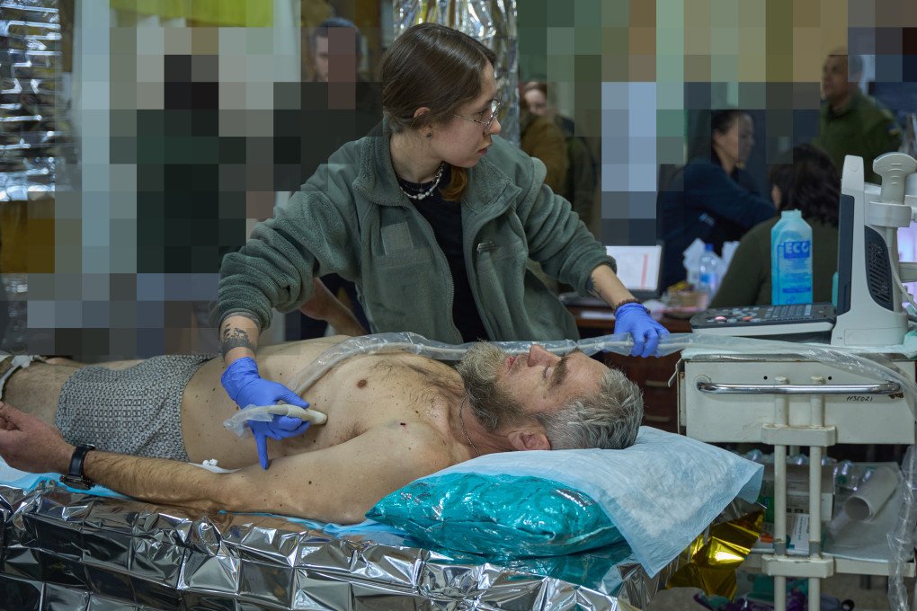 A 3rd Assault Brigade medic tends to a newly arrived 52-year-old wounded Ukrainian soldier. Background blurred for safety. (Source: UNITED24 Media/Mykyta Shandyba) A 3rd Assault Brigade medic tends to a newly arrived 52-year-old wounded Ukrainian soldier. Background blurred for safety. (Source: UNITED24 Media/Mykyta Shandyba)