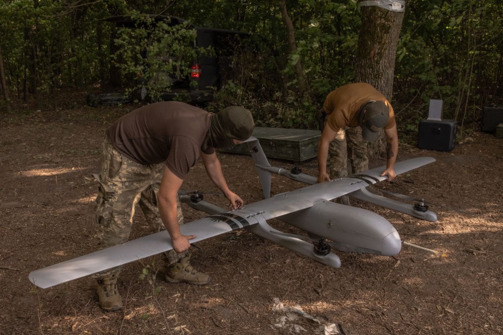 Ukrainian military drone operators of the 22nd Mechanized Brigade assemble a Poseidon reconnaissance unmanned aerial vehicle on their position, in the Sumy region, near the border with Russia, on August 11, 2024, amid the Russian invasion of Ukraine. (Source: Getty Images) Ukrainian military drone operators of the 22nd Mechanized Brigade assemble a Poseidon reconnaissance unmanned aerial vehicle on their position, in the Sumy region, near the border with Russia, on August 11, 2024, amid the Russian invasion of Ukraine. (Source: Getty Images)