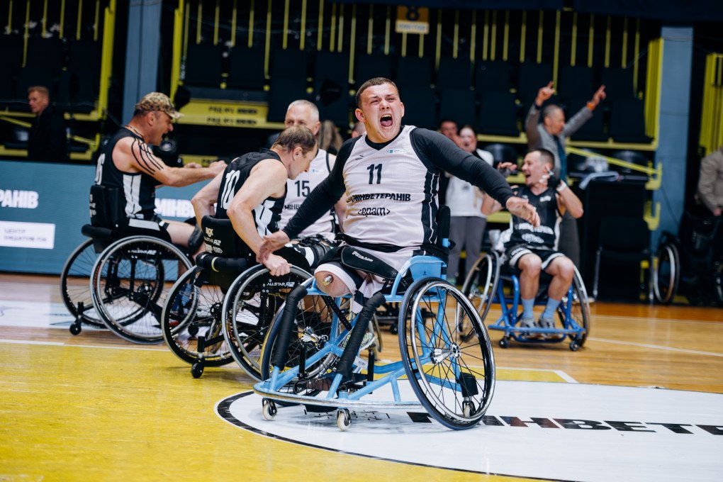 Ukrainian para-athlete Oleksandr Tolochenko (#11) celebrates with unrestrained emotion after a key play during the All-Ukrainian Wheelchair Basketball Tournament for veterans. Photo: Serhii Halushka, Come Back Alive Foundation Ukrainian para-athlete Oleksandr Tolochenko (#11) celebrates with unrestrained emotion after a key play during the All-Ukrainian Wheelchair Basketball Tournament for veterans. Photo: Serhii Halushka, Come Back Alive Foundation