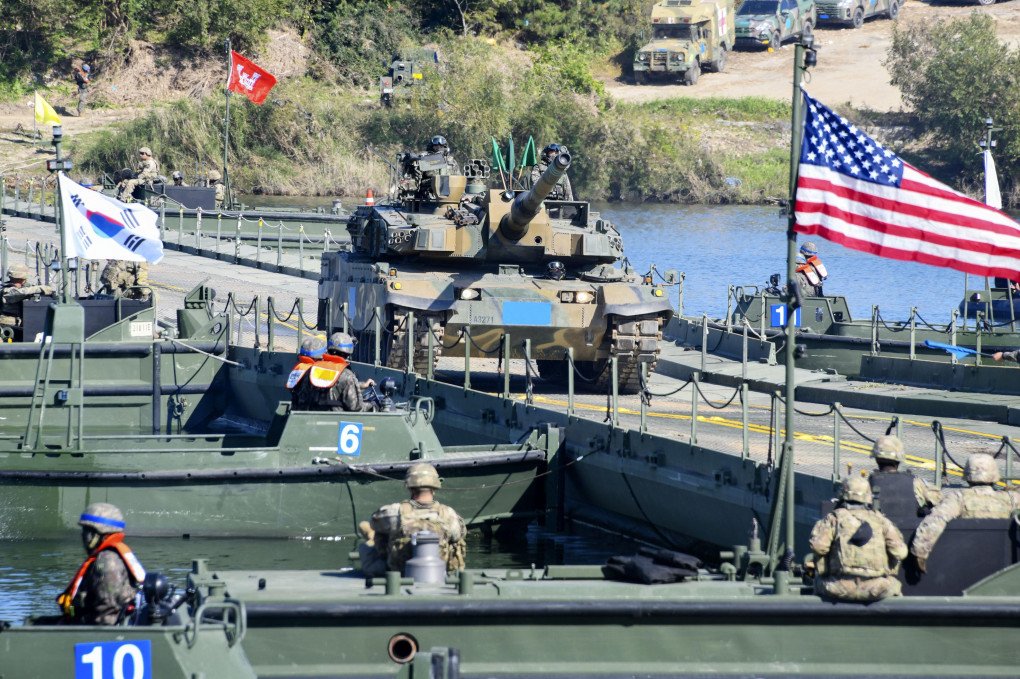 A South Korean military tank crosses a floating bridge during a U.S.-South Korea joint military drill in Yeoju, South Korea, on Oct. 19, 2022. (Photo by Kyodo News via Getty Images)