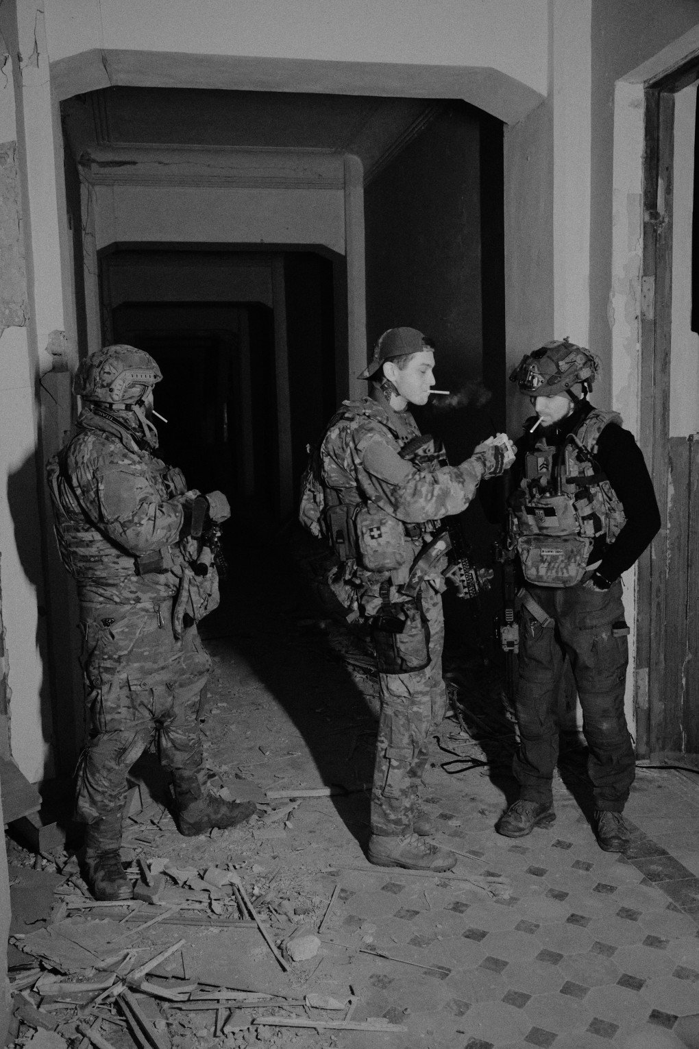 Hepa with his fellow soldiers near the eastern front of Ukraine stopping for a cigarette . Photo: Joshua Olley