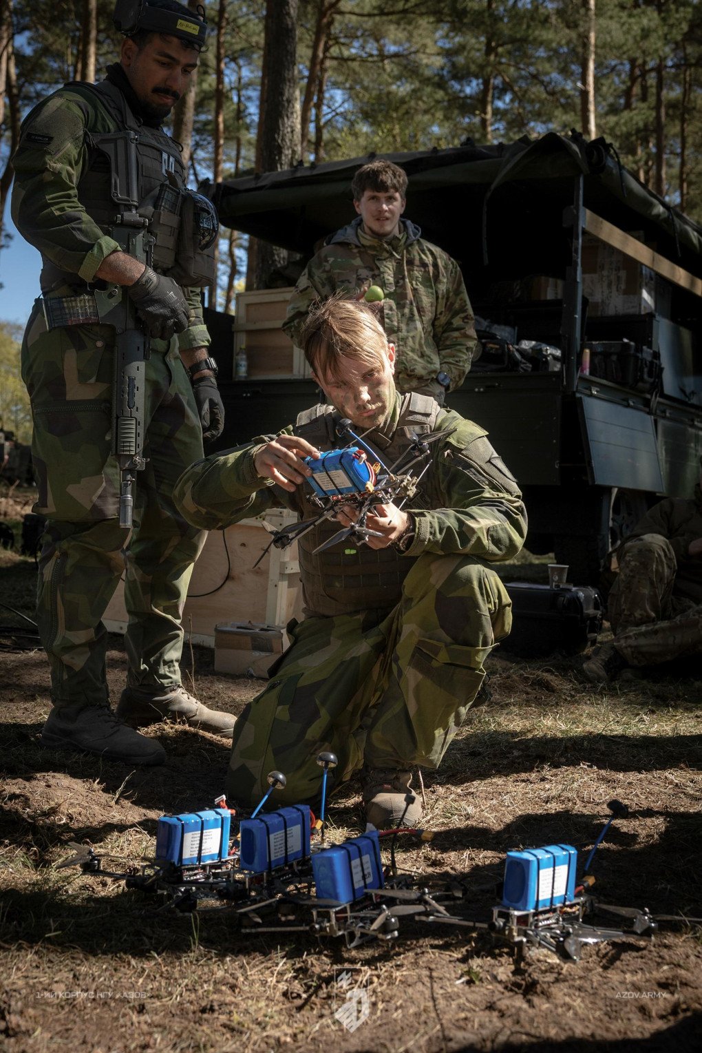 A Swedish drone operator inspects an FPV war drone at exercise Aurora 26. Photo by Swedish Armed Forces. Source: The 1st Corps of the Ukrainian National Guard “Azov” A Swedish drone operator inspects an FPV war drone at exercise Aurora 26. Photo by Swedish Armed Forces. Source: The 1st Corps of the Ukrainian National Guard "Azov"