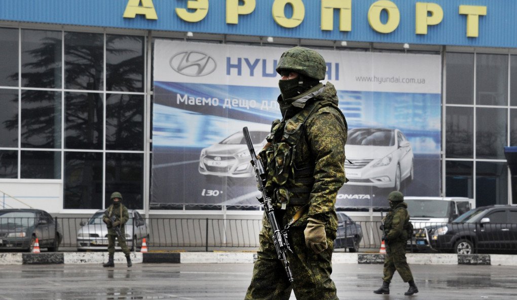 Unidentified armed men—Russian troops—patrol outside of Simferopol airport, on February 28, 2014. (Photo: VIKTOR DRACHEV/AFP via Getty Images) Unidentified armed men—Russian troops—patrol outside of Simferopol airport, on February 28, 2014. (Photo: VIKTOR DRACHEV/AFP via Getty Images)