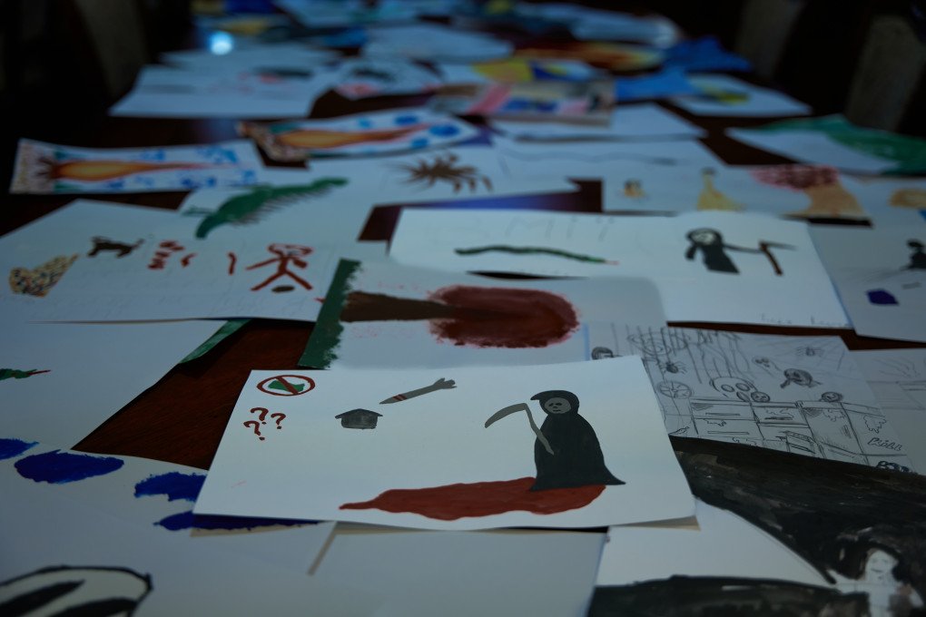 The children were asked to draw their fears: missiles, figures of death, blood, and ominous symbols appeared on the paper. What they cannot express in words, they convey with paint. The children were asked to draw their fears: missiles, figures of death, blood, and ominous symbols appeared on the paper. What they cannot express in words, they convey with paint.