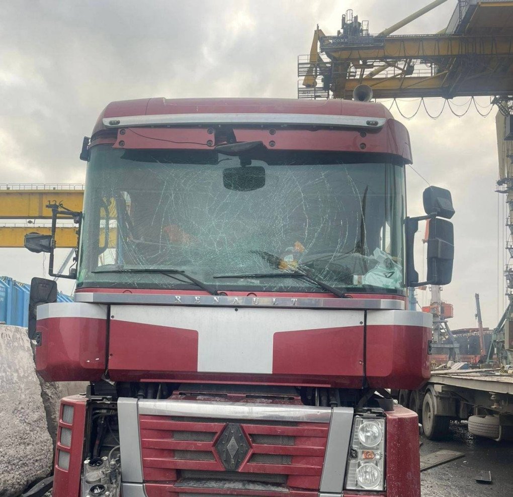 The shattered windshield of a Renault truck parked at the facility, one of several vehicles damaged during the strike on port infrastructure. (Source: Oleksii Kuleba)