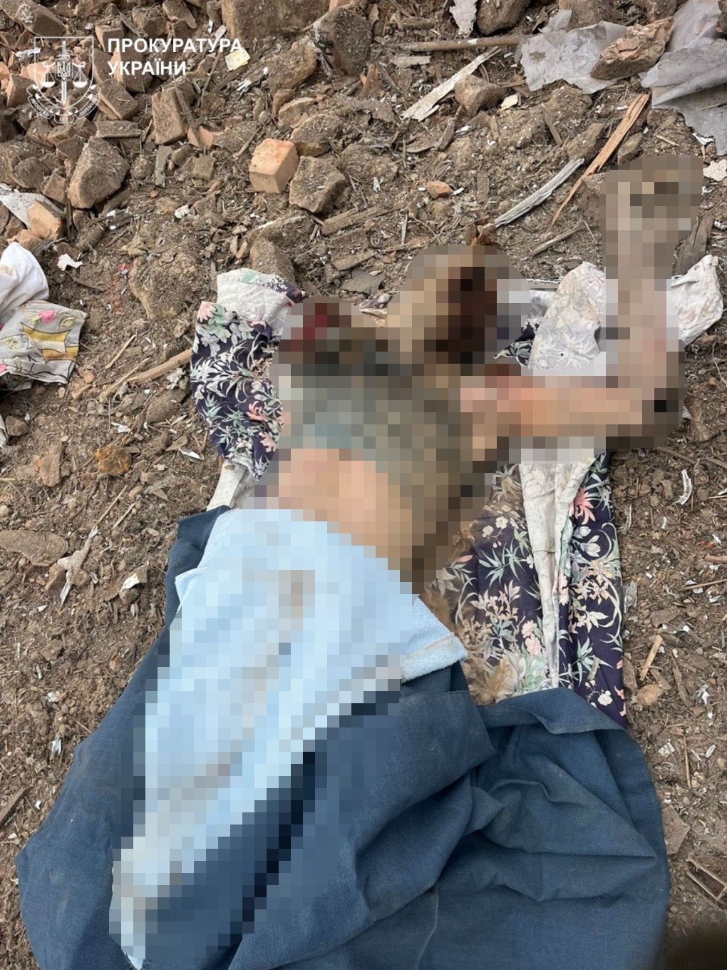 The body of a civilian killed in a Russian airstrike lies amid debris after a guided FAB-250 bomb. (Photo: Donetsk Regional Prosecutor’s Office)