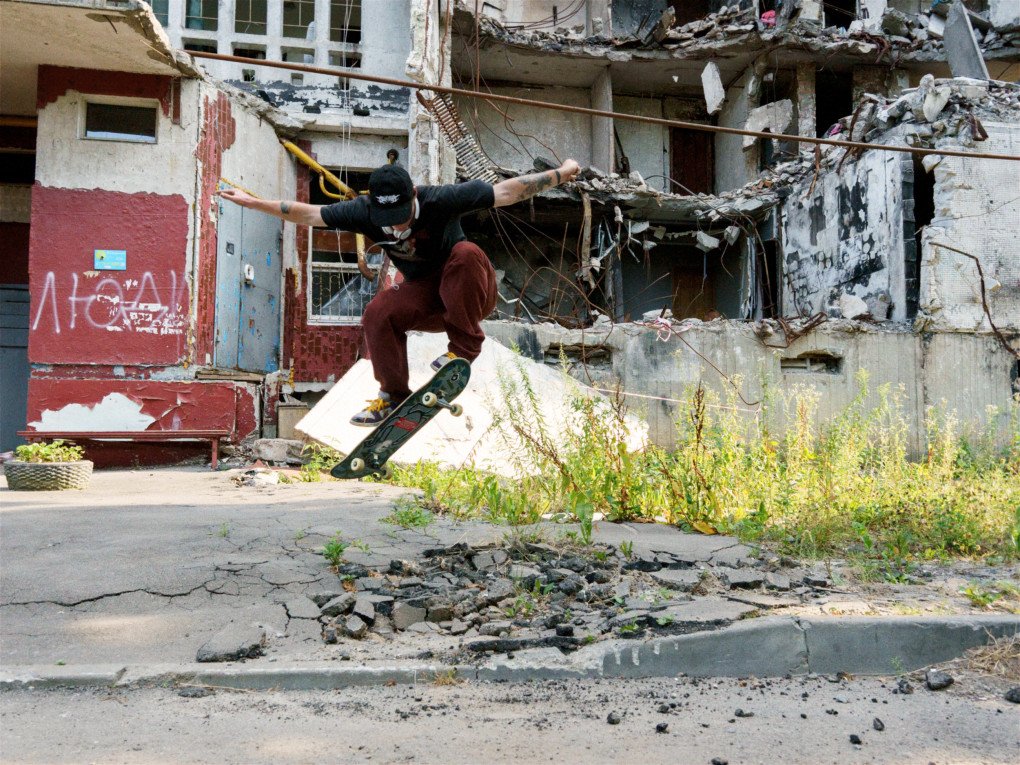 A skater attempts a trick over a damaged stretch of pavement. (Photo: Hironori Kodama)