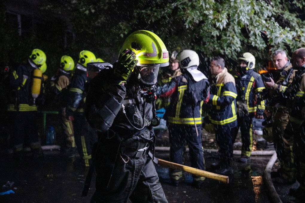 Ukrainian rescuers work at the site of a Russian missile strike at an apartment building in Kyiv on October 14, 2026, amid the Russian invasion of Ukraine. (Photo by Genya Savilov via Getty Images)