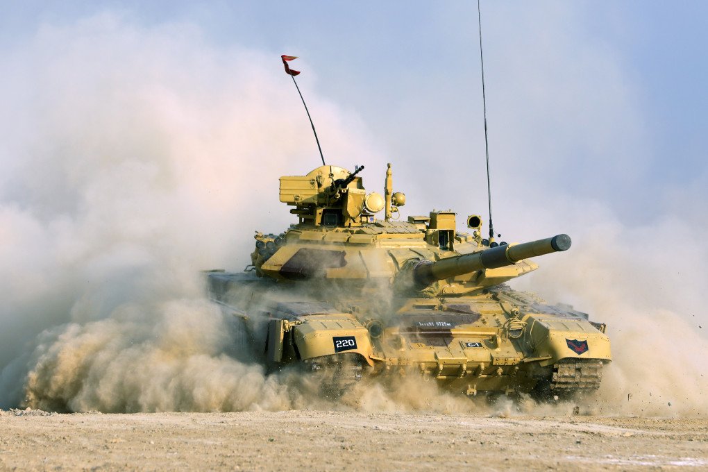 An Indian Army Bhishma T-90 battle tank performs an operational demonstration during the DefExpo 20 in Lucknow, Uttar Pradesh, India, on February 5, 2020. (Source: Getty Images)