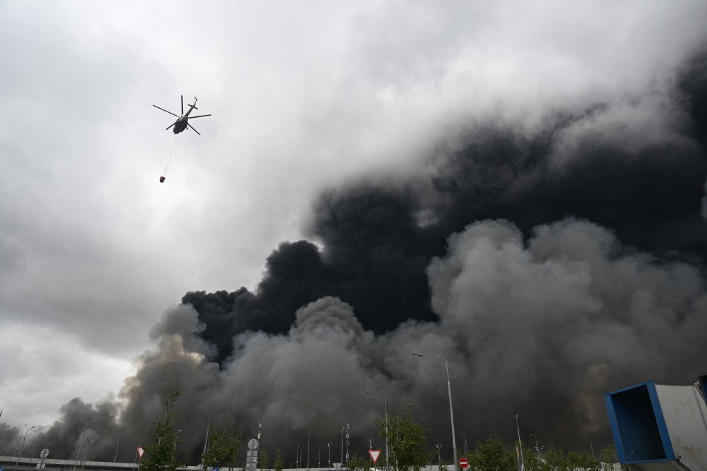 A firefighting helicopter is carrying water as black smoke billows from the area of Gazprom Neftâs Moscow oil refinery, located on the southeastern outskirts of Moscow, on June 18, 2026. (Photo by Sefa Karacan via Getty Images) A firefighting helicopter is carrying water as black smoke billows from the area of Gazprom Neftâs Moscow oil refinery, located on the southeastern outskirts of Moscow, on June 18, 2026. (Photo by Sefa Karacan via Getty Images)