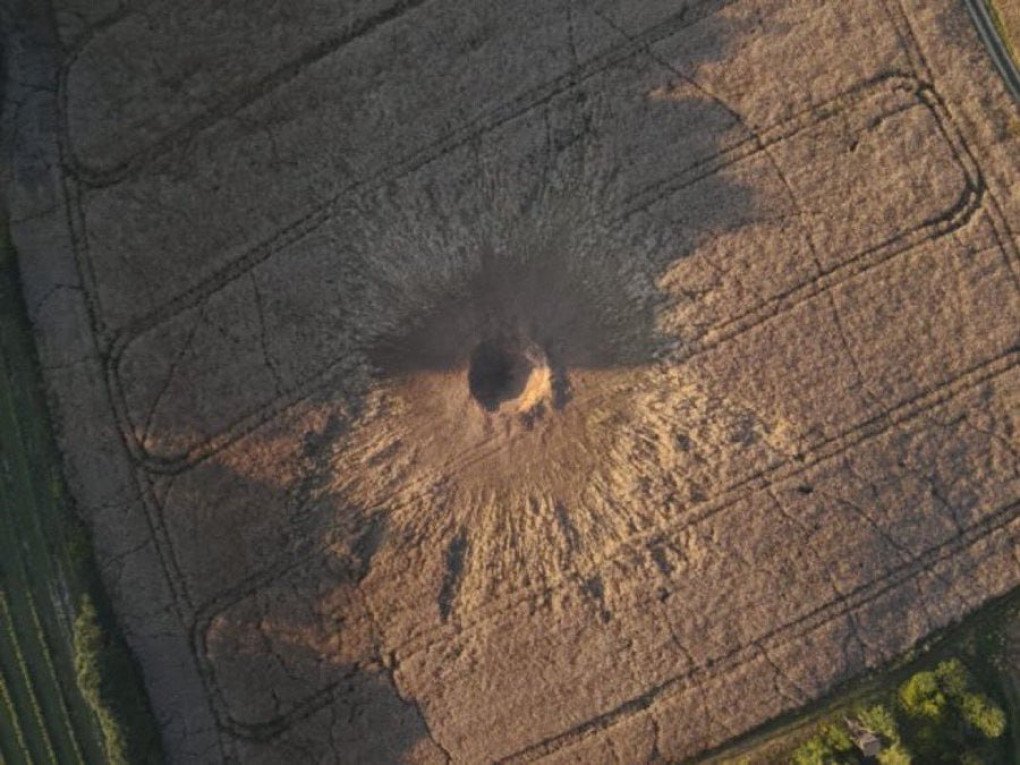 10-meter crater left after a Russian cruise missile impact in Poland.