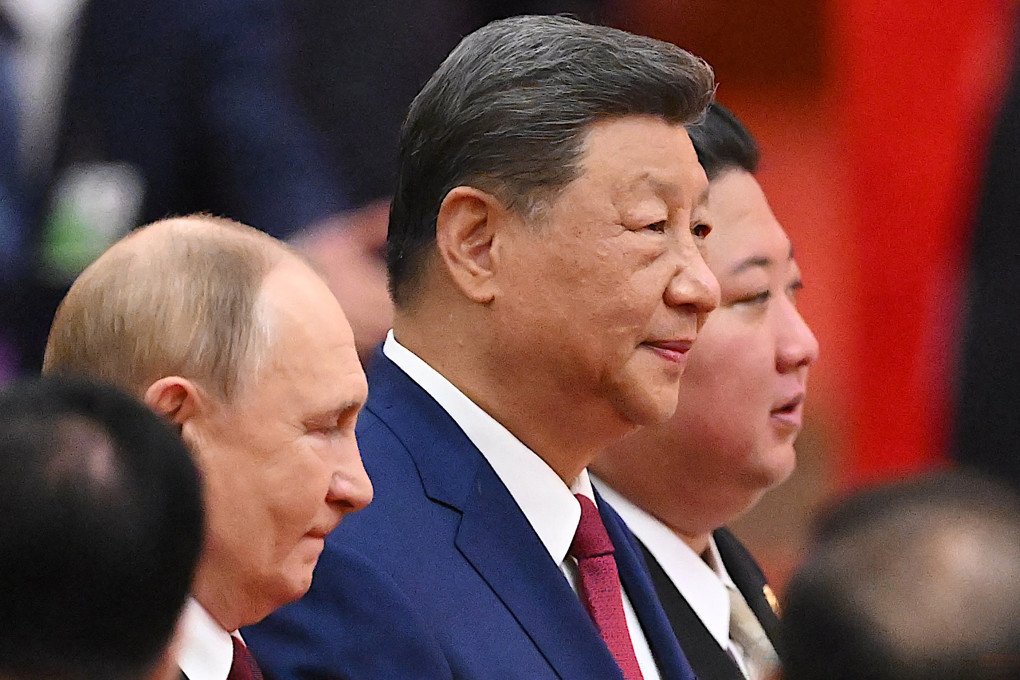 Xi Jinping, Kim Jong Un, and Vladimir Putin arrive at the Great Hall of the People after the military parade in Beijing, September 3, 2025. (Source: Getty Images)