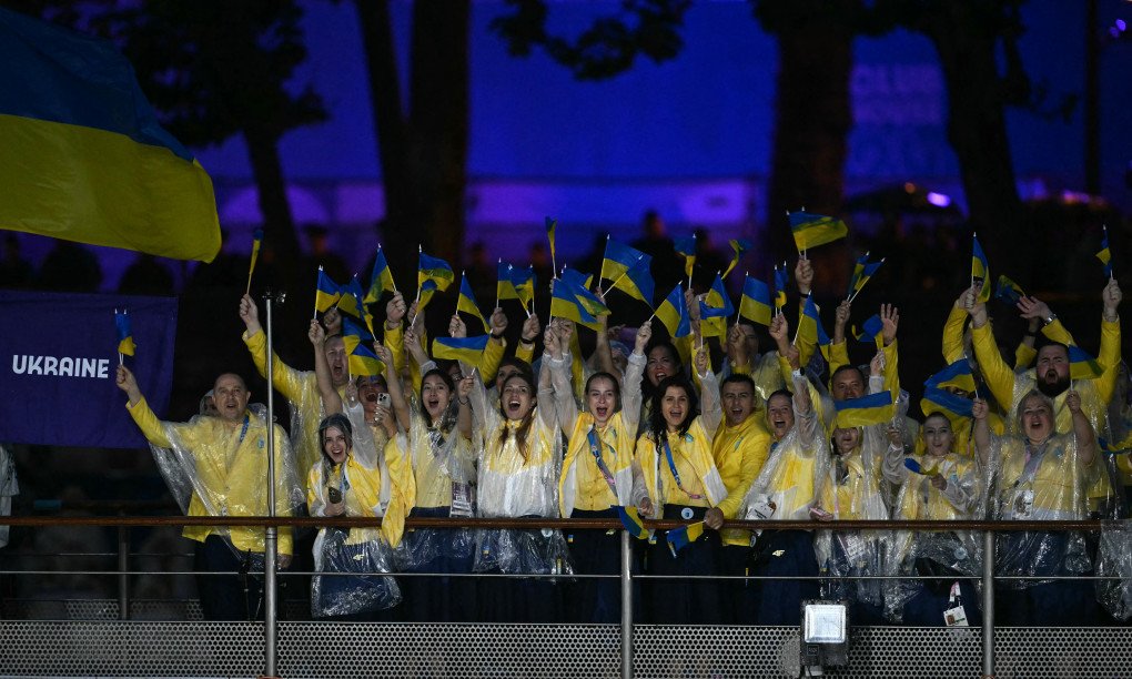 Athletes from the Ukraine delegation sail in a boat along the Seine river during the opening ceremony of the Paris 2024 Olympic Games in Paris on July 26, 2024. (Source: Getty Images)