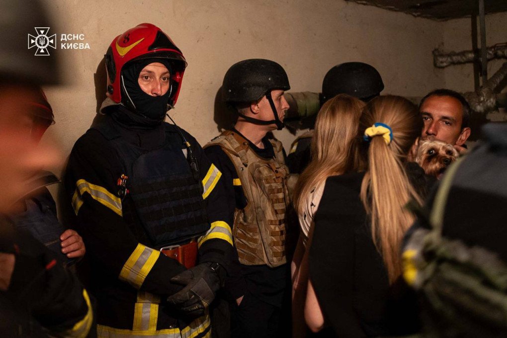 Firefighters take shelter with civilians during a massive Russian combined strike on Kyiv, July 4, 2025. (Source: SES) Firefighters take shelter with civilians during a massive Russian combined strike on Kyiv, July 4, 2025. (Source: SES)