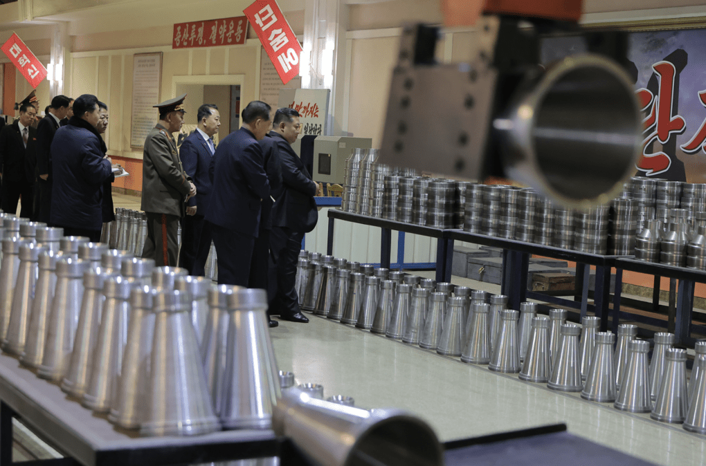 North Korean leader Kim Jong Un inspects munitions components at a weapons factory. (Source: KCNA)
