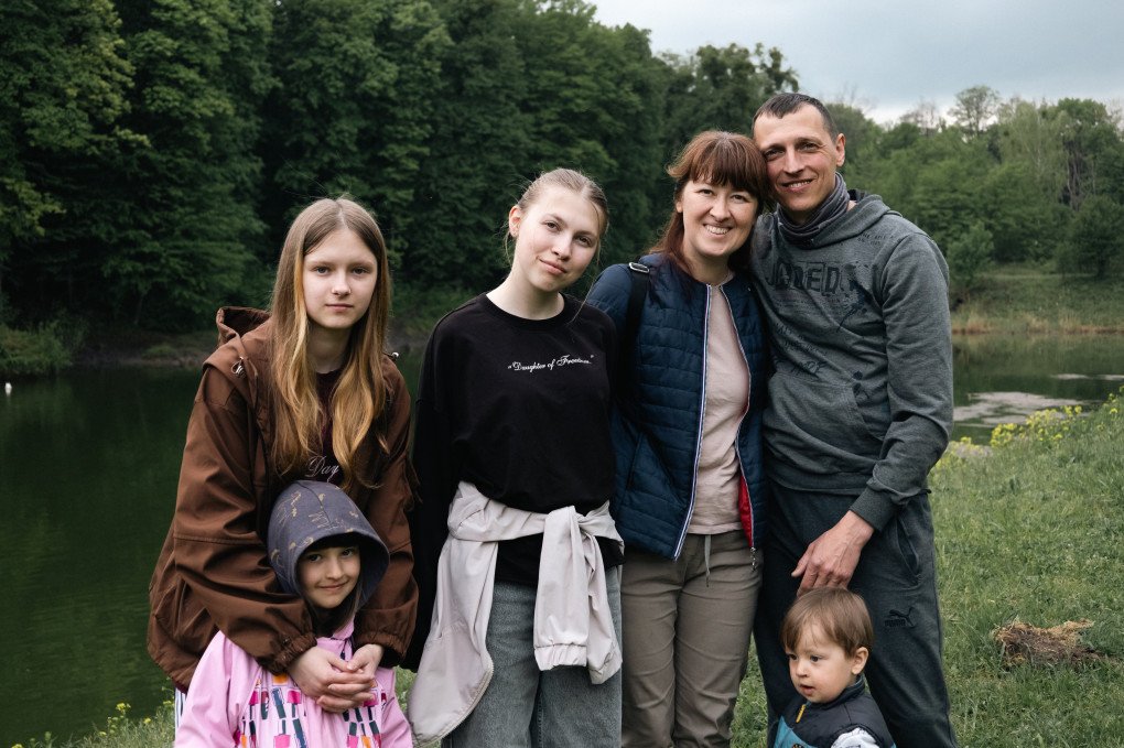 Russo-Ukrainian war veteran Mykhailo, his wife Viktoriia, and their 4 children, beneficiaries of the Veteran’s Family program organized by Caritas-Spes Ukraine. May 2026, the Zhytomyr region, Ukraine. (Photo: Louis Beaudemont/UNITED24 Media) Russo-Ukrainian war veteran Mykhailo, his wife Viktoriia, and their 4 children, beneficiaries of the Veteran’s Family program organized by Caritas-Spes Ukraine. May 2026, the Zhytomyr region, Ukraine. (Photo: Louis Beaudemont/UNITED24 Media)
