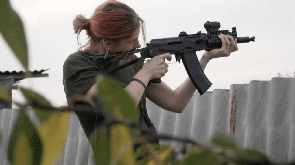 Albina, who traded her work as a salon manicurist to join the defense of Ukraine, is one of the documentary's seven main subjects. August 2022, Tavriiske, Kherson region. (Photo: Xackery Irving)